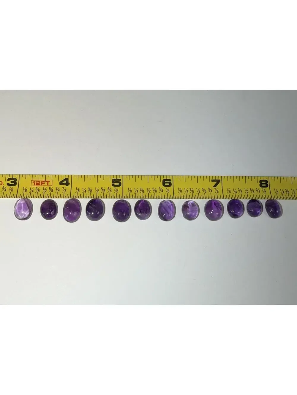 GEMS Set of 12 Polished Natural Amethyst Cabochon Shape Gemstones